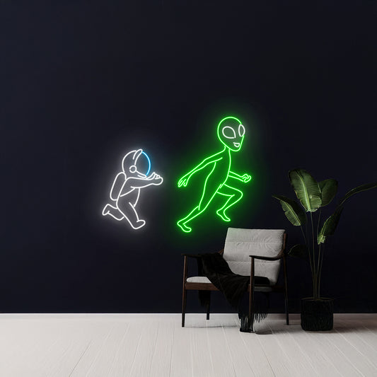 Astronaut Chasing Alien Neon Sign