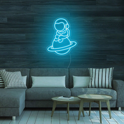 Astronaut Sitting On Planet Led Neon Sign For Space Enthusiasts | Shineneon