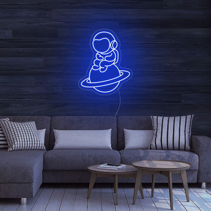 Astronaut Sitting On Planet Led Neon Sign For Space Enthusiasts | Shineneon
