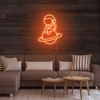 Astronaut Sitting On Planet Led Neon Sign For Space Enthusiasts | Shineneon