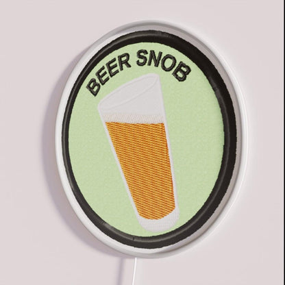 Beer Snob Geek Merit Badge Rgb Led Neon Sign - Neon sign mounted on wall in room