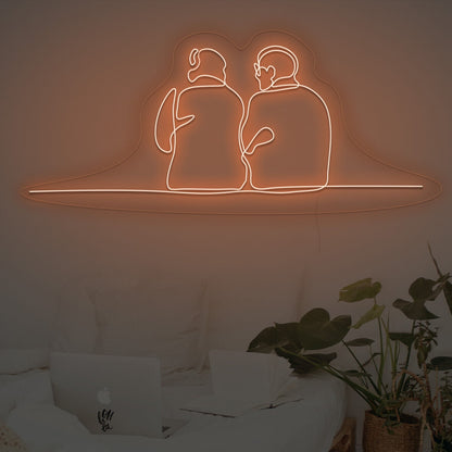 Couple Sitting Together Neon Sign | Shineneon