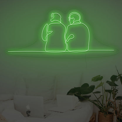 Couple Sitting Together Neon Sign | Shineneon