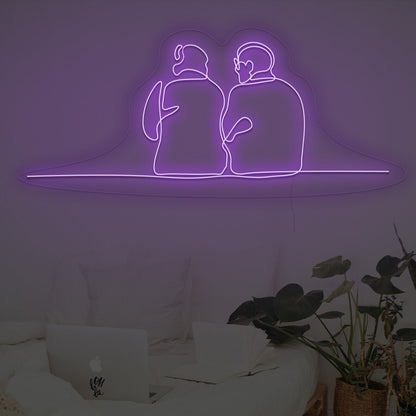 Couple Sitting Together Neon Sign | Shineneon