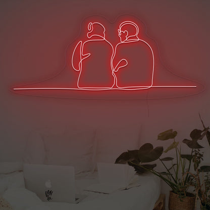 Couple Sitting Together Neon Sign | Shineneon