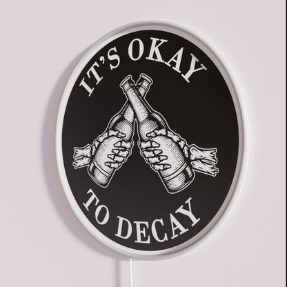 Its Okay To Decay Rgb Led Neon Sign - Neon sign mounted on wall in room