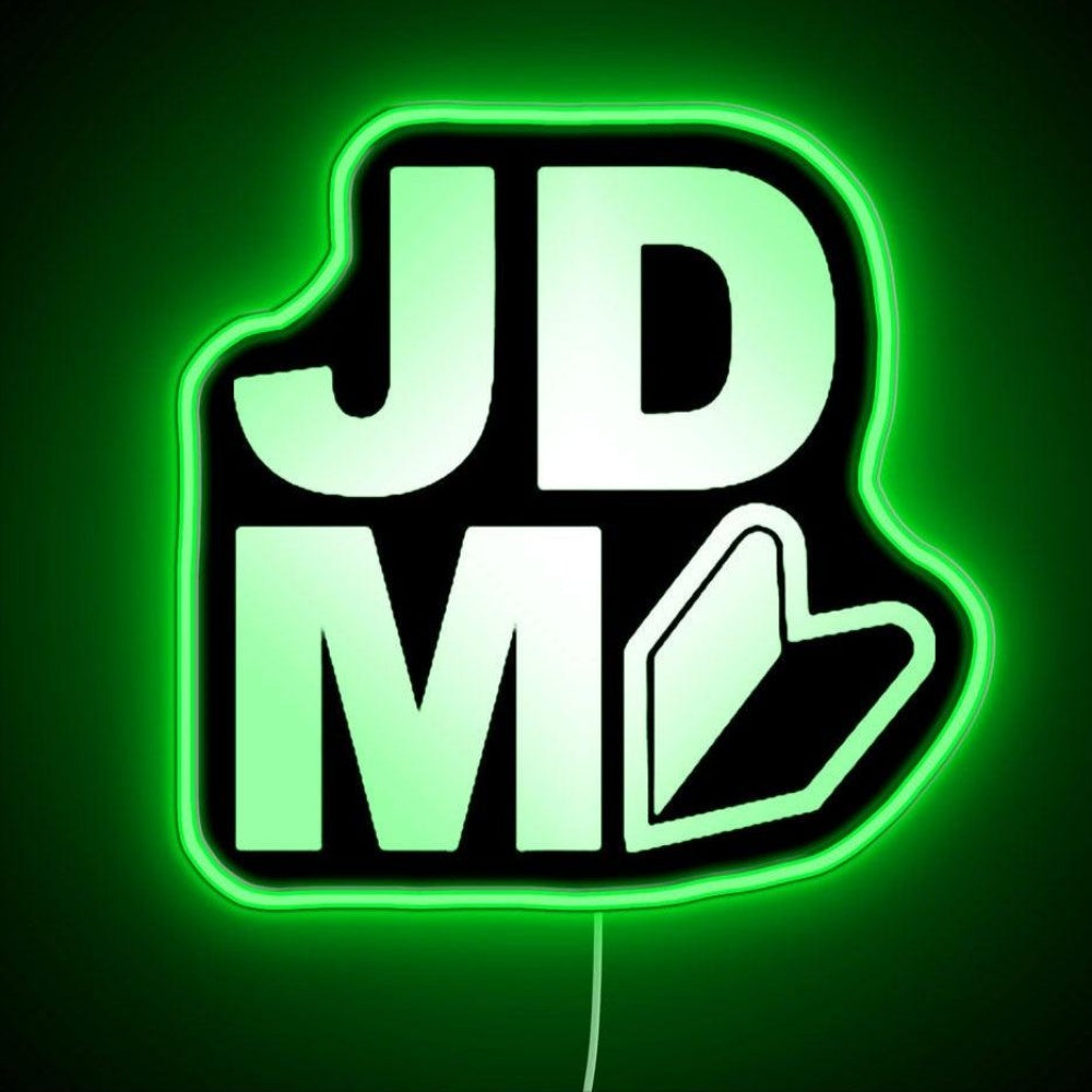 Jdm Logo Neon Sign - Neon sign mounted on wall in room