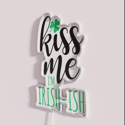 Kiss Me I M Irish Ish Rgb Led Neon Sign - Neon sign mounted on wall in room
