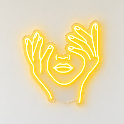 Hands Framing Face LED Neon Sign - natural light view
