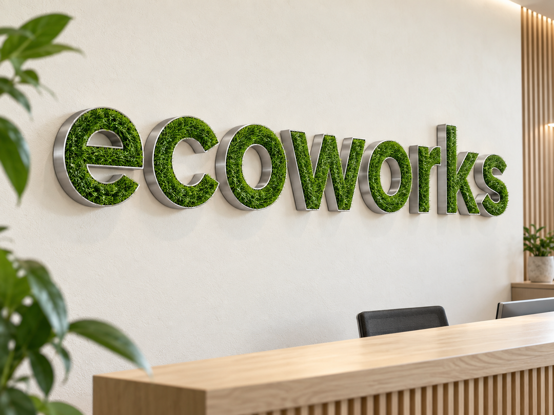 Concept visualization of non-illuminated dimensional letters with green grass faces and brushed silver metal sides.