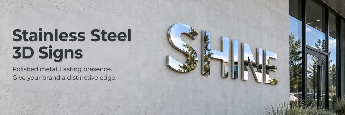 Polished stainless steel SHINE 3D letters mounted on a modern exterior wall.