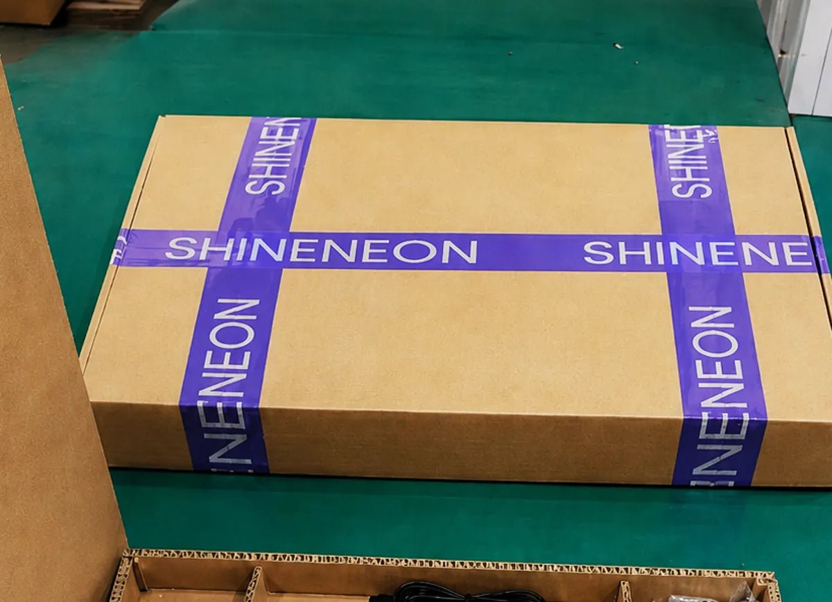 A real ShineNeon shipping carton sealed with branded tape